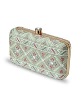 Ariba Green Box Clutch by The Tan Clan featuring a sleek rectangular design with a smooth green finish and elegant clasp closure.
