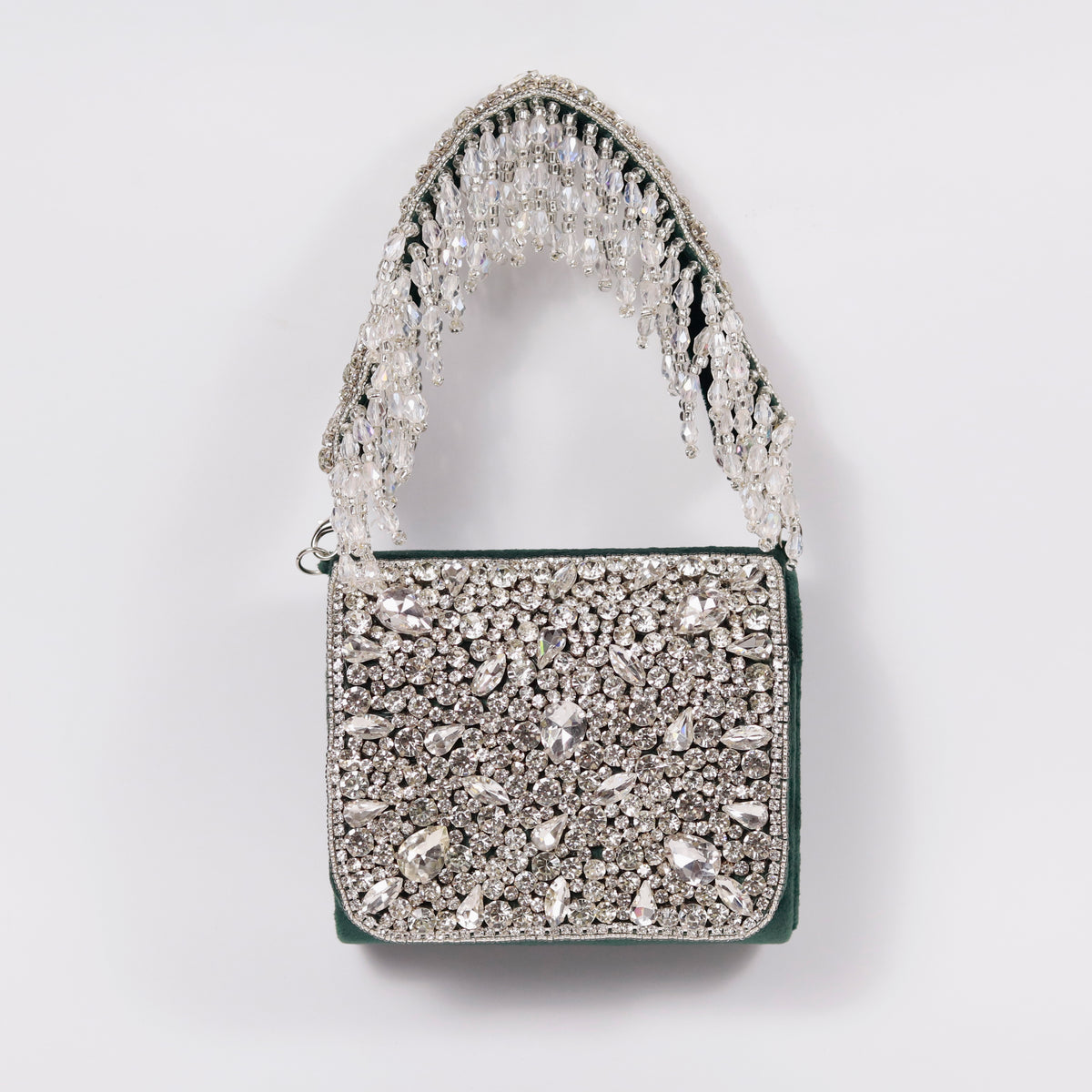Grace Mini Bag by The Tan Clan featuring an embroidered handle and compact design with stylish, colorful embroidery details.