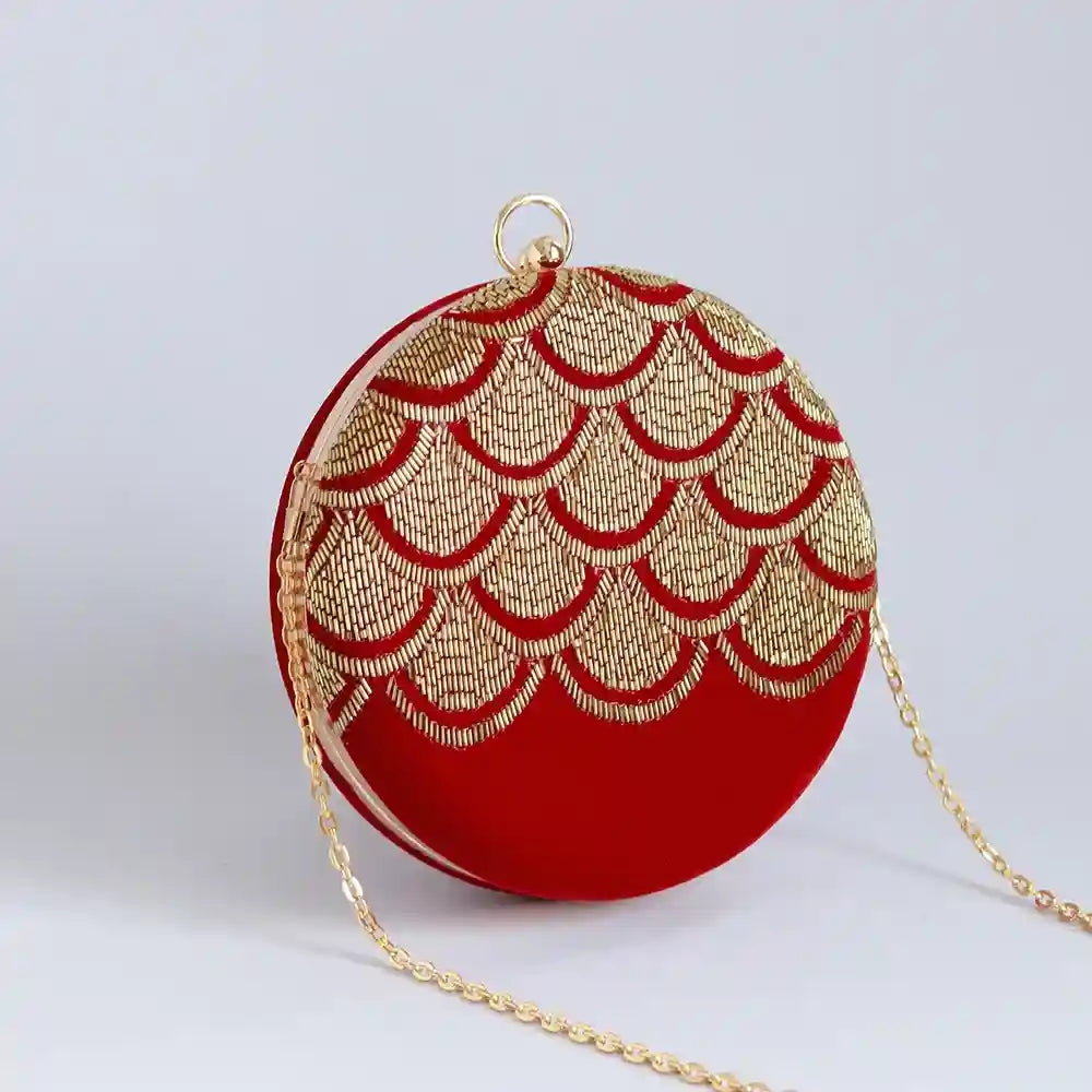 Rajwada hand-embroidered clutch by The Tan Clan featuring intricate traditional embroidery and elegant design.