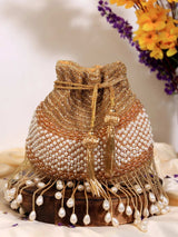 The Tan Clan Dua Gold Pearl potli bag with shimmering gold finish and pearl embellishments