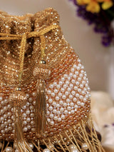 The Tan Clan Dua gold pearl potli bag with beaded drawstring closure and compact rounded design