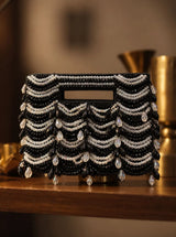 Lara Black Handcrafted Beaded Bag by THE TAN CLAN featuring intricate beadwork and a compact design for stylish occasions.