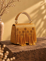 Maria Gold Handcrafted Beaded Tasselled Bag by THE TAN CLAN, featuring intricate beadwork, tassels, and a stylish design.