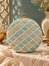 Veda round embroidered clutch bag by THE TAN CLAN featuring intricate colorful embroidery and a compact, stylish design.