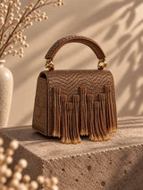 Maria Bronze handcrafted beaded tasselled bag by THE TAN CLAN, featuring intricate beadwork and a stylish tassel detail.