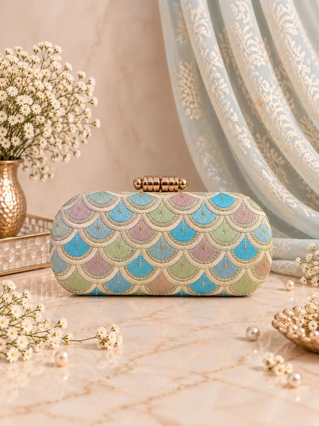 Veda long embroidered clutch by THE TAN CLAN featuring intricate embroidery and a sleek, elegant design.