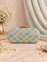 Veda long embroidered clutch by THE TAN CLAN featuring intricate embroidery and a sleek, elegant design.