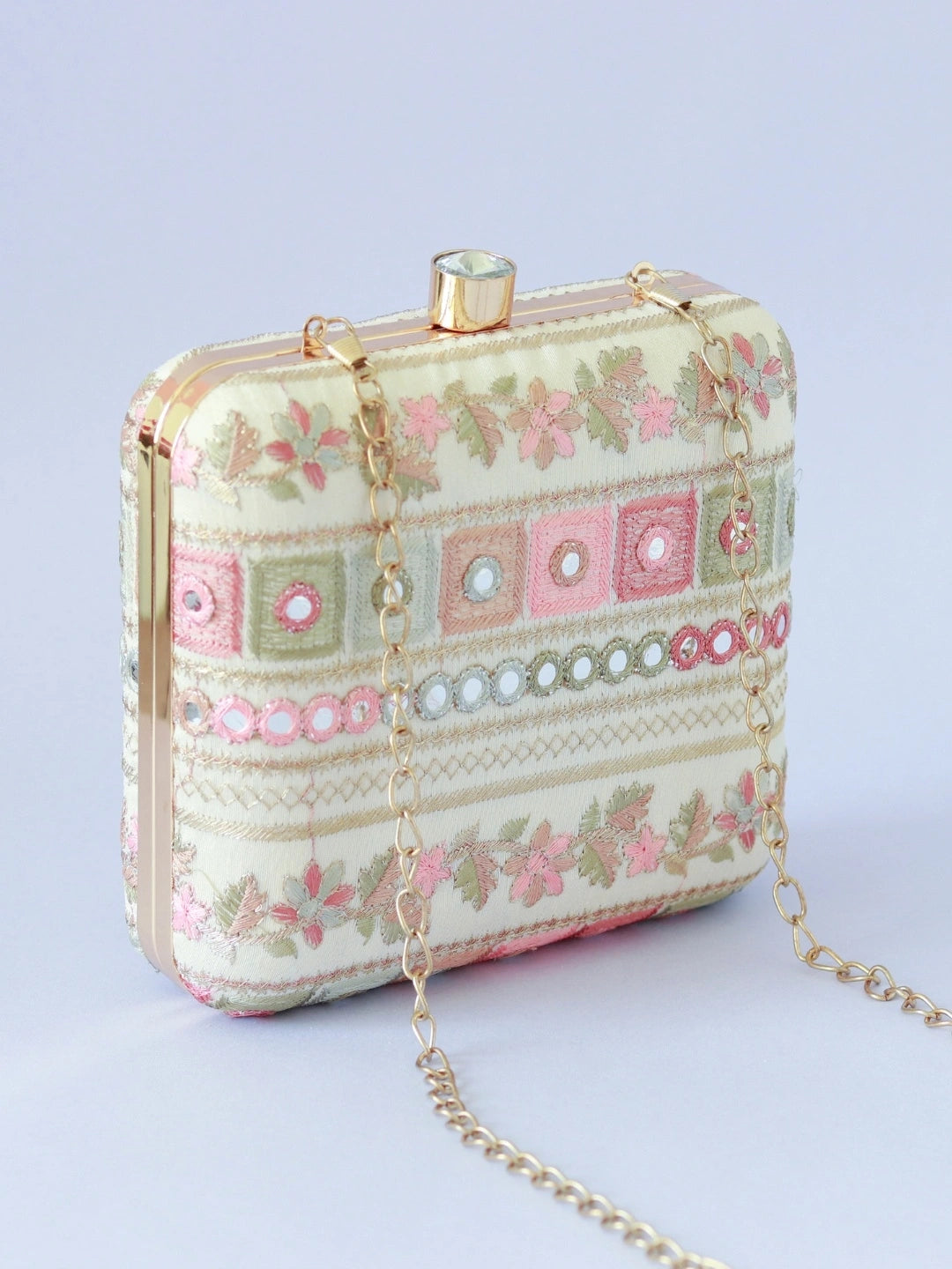 Elegant Phulwaari floral box clutch by The Tan Clan with intricate embroidery and vibrant floral designs.