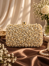 Kate Pearl Box Clutch by THE TAN CLAN featuring a sleek pearl finish and elegant box design for evening occasions.