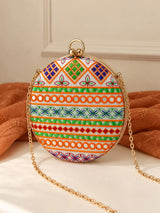 Multicolor round clutch bag by THE TAN CLAN featuring vibrant, multicolored design and a compact, stylish shape.