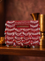 Lara red handcrafted beaded bag by THE TAN CLAN with intricate beaded design and compact size.