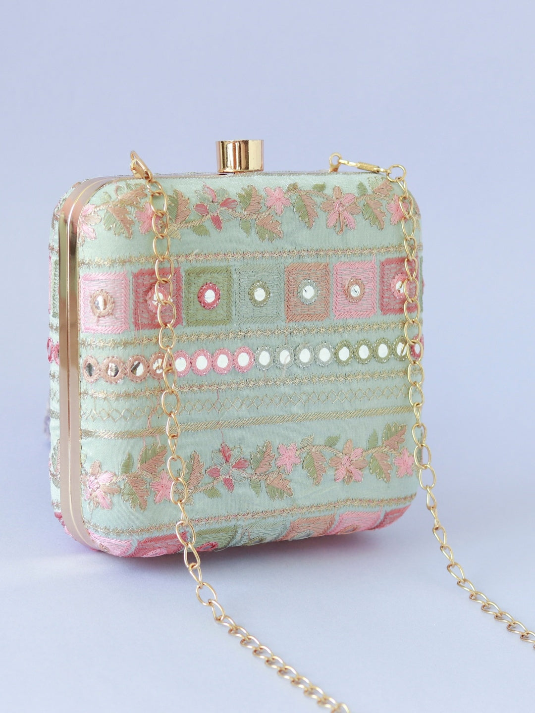 Phulwaari floral box clutch by The Tan Clan featuring vibrant floral embroidery and a sleek, compact design.