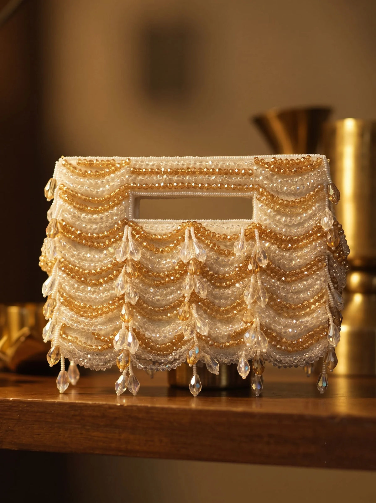 Lara White Handcrafted Beaded Bag by THE TAN CLAN featuring intricate beadwork and a stylish compact design.