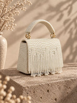 Maria white handcrafted beaded tasselled bag with intricate detailing and fringe, by THE TAN CLAN.