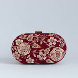 Begum Zardozi hand-embroidered clutch bag with intricate gold threadwork and embellishments, crafted by The Tan Clan.
