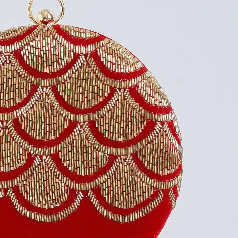 Rajwada hand embroidered clutch by The Tan Clan, featuring intricate traditional embroidery and elegant design.