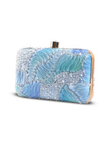 Aqua blue box clutch purse with gold clasp from The Tan Clan, featuring a sleek, elegant design and smooth textured surface.