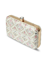 White box clutch bag by The Tan Clan with a sleek, minimalist design and smooth texture, perfect for evening accessories.