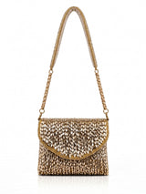 Anaya Gold Envelope Bag by THE TAN CLAN featuring a sleek gold envelope design with a flap closure and minimalist style.