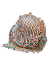 Sona Pearl Tasselled Batua bag with detachable handle by The Tan Clan, featuring pearl embellishments and traditional design.