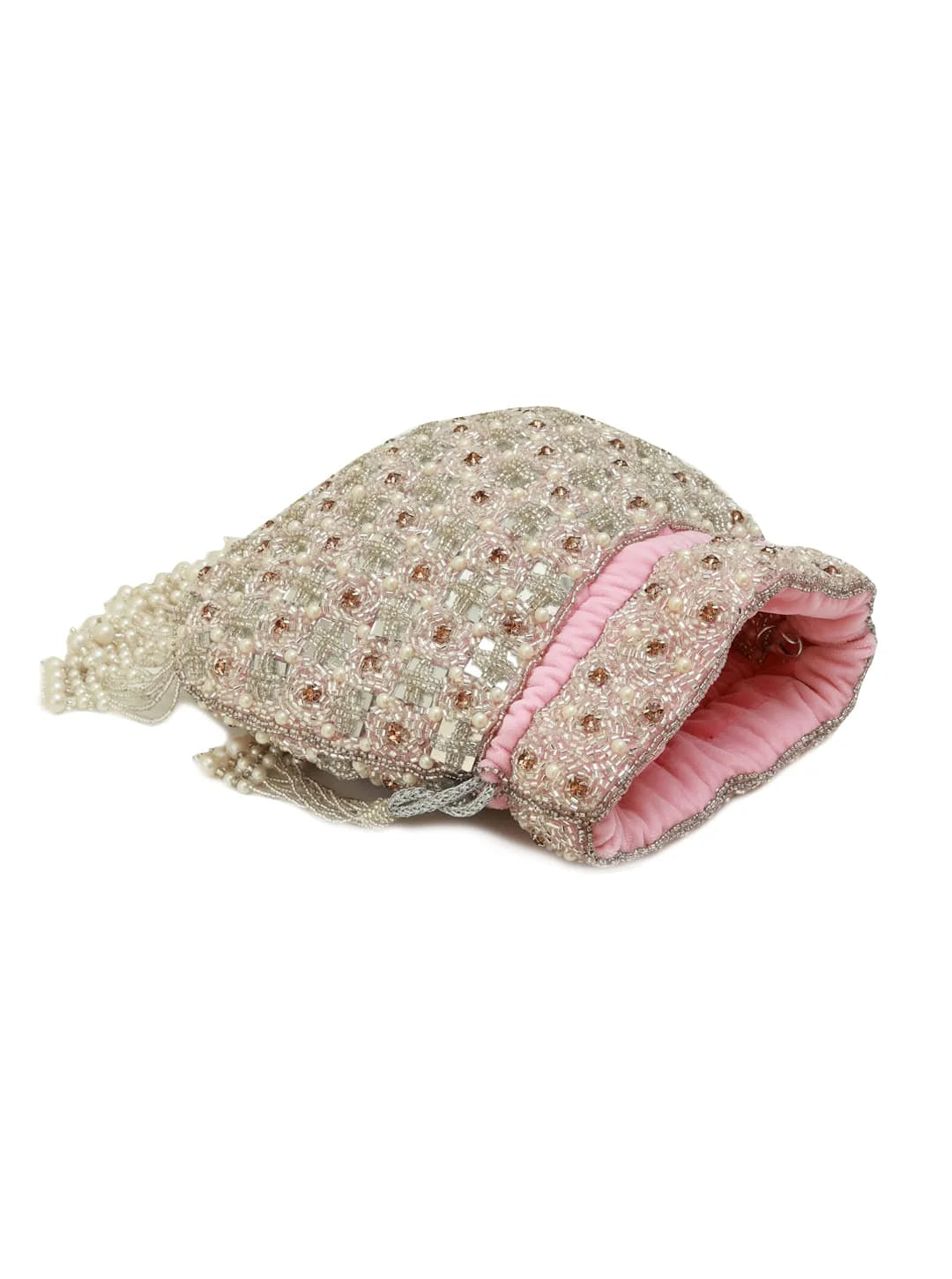 Floral-patterned pet bed with pink interior on a white background