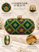 Dark green oval clutch bag by THE TAN CLAN featuring a sleek design and compact size.