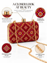 Red box clutch purse by THE TAN CLAN featuring a sleek, compact design perfect for evening and special occasions.