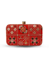Red box clutch bag from The Tan Clan's Elora collection, featuring a sleek rectangular design and elegant finish.