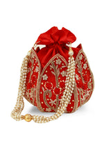 Red Lotus Potli bag from The Tan Clan, traditional fabric purse with intricate embroidery and drawstring closure.