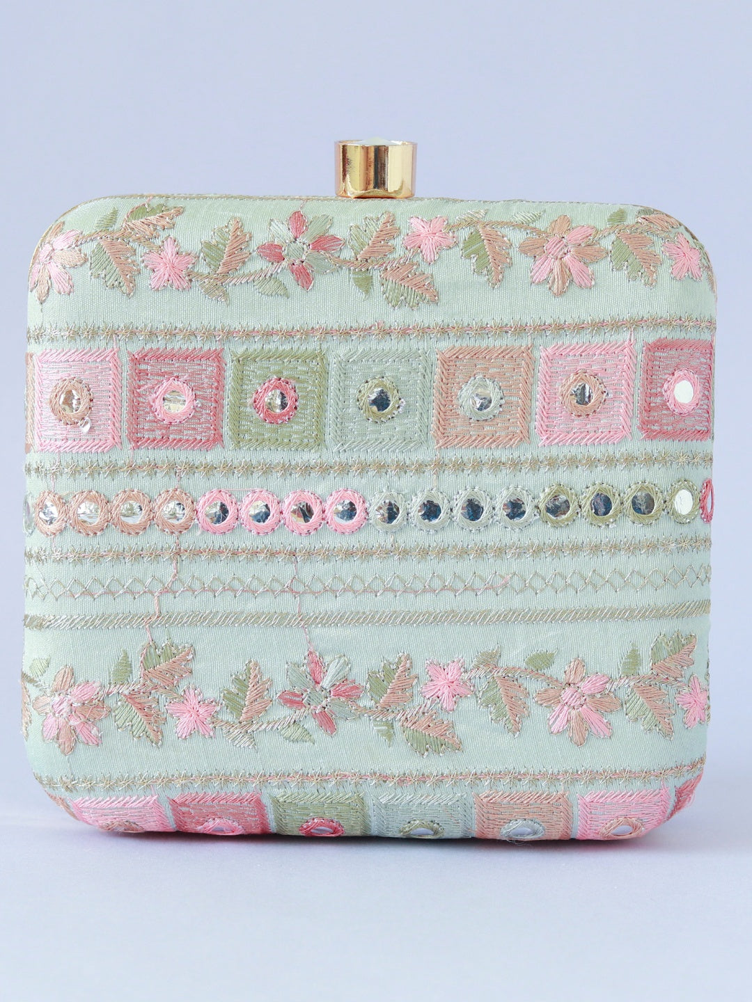 The Tan Clan Phulwaari floral box clutch with intricate embroidery and vibrant floral design on a structured purse.