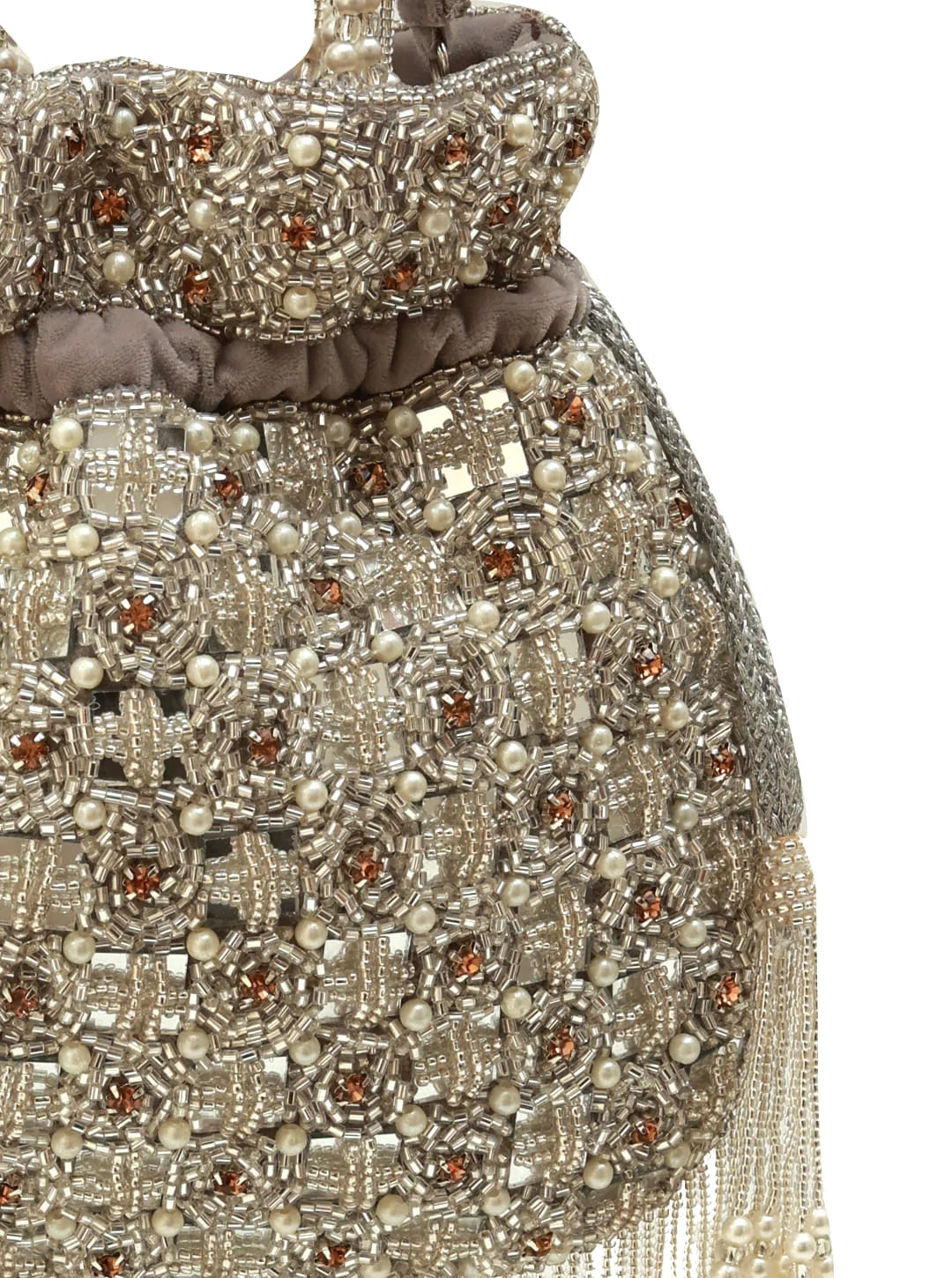 Close-up of an ornate handbag with bead and crystal detailing on a white background