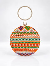 Multicolor round clutch bag by THE TAN CLAN featuring vibrant patterns and a sleek design.