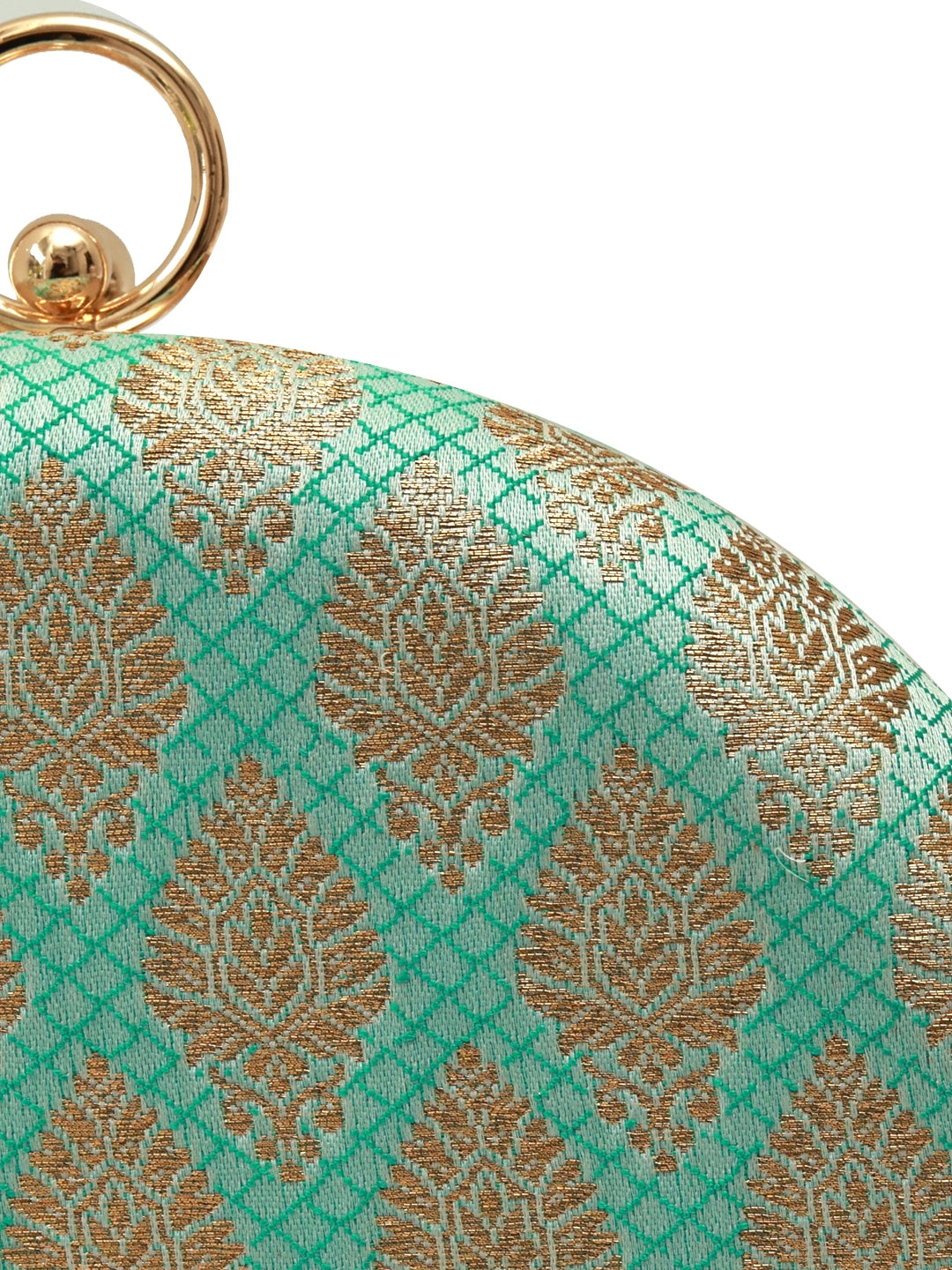 Green round clutch by The Tan Clan featuring a classic design with a smooth, vibrant exterior and compact shape.
