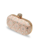 Inaara Peach Oval Clutch from The Tan Clan with gold clasp and smooth leather finish, stylish accessory for evening wear.