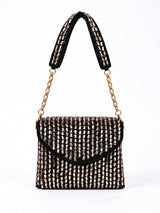 Anaya Black Envelope Bag by THE TAN CLAN featuring sleek design with a flap closure and minimalist style.