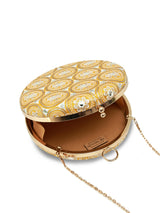 Yellow round clutch bag by The Tan Clan, Inaara style with a sleek design and smooth texture, perfect for stylish events.