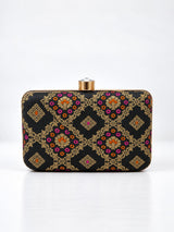Mahi Black Box Clutch by THE TAN CLAN featuring sleek design and compact size with a matte finish and gold-tone clasp.