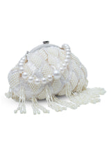 Tara Pearl Tasselled Batua by The Tan Clan featuring pearl embellishments, tassels, and a detachable handle for traditional elegance.