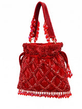 Red sequined tasselled potli bag with intricate embellishments from THE TAN CLAN for traditional or festive occasions.