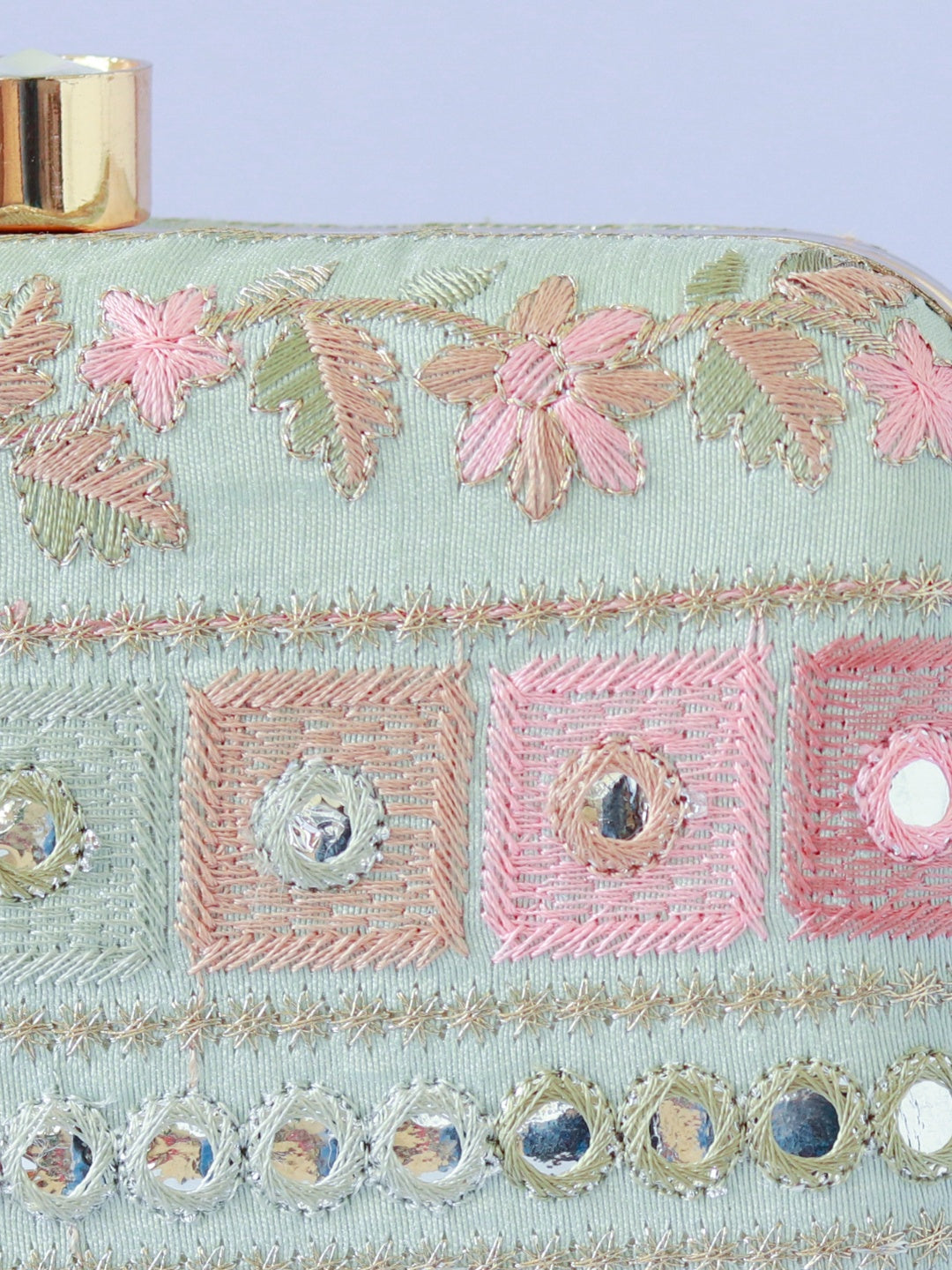 Elegant Phulwaari floral box clutch by The Tan Clan with intricate embroidery and vibrant floral design.