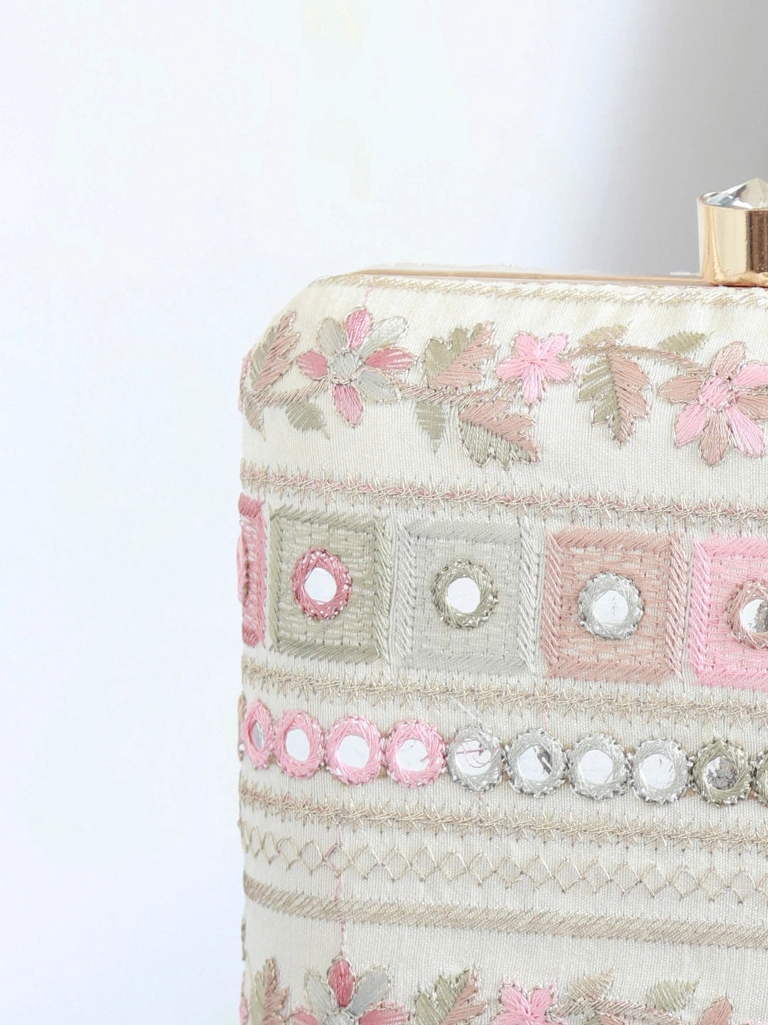 Flawless Phulwaari floral box clutch by The Tan Clan with intricate embroidery and vibrant floral patterns.