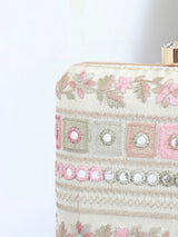 Flawless Phulwaari floral box clutch by The Tan Clan with intricate embroidery and vibrant floral patterns.