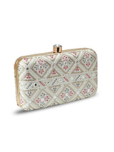White box clutch bag by The Tan Clan, stylish accessory with sleek design and compact size for evening or formal events.