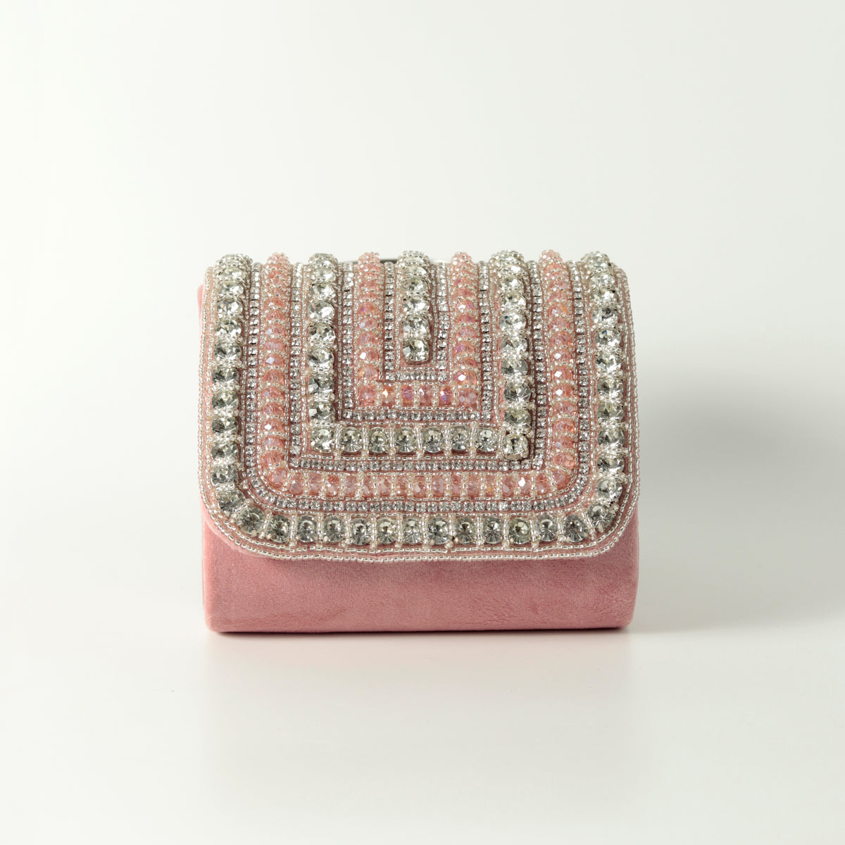 Nysa pink mini bag by The Tan Clan featuring an embroidered handle and compact design for everyday style.