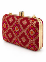 Mahi Red Box Clutch by THE TAN CLAN, stylish rectangular accessory with sleek design and vibrant red color.