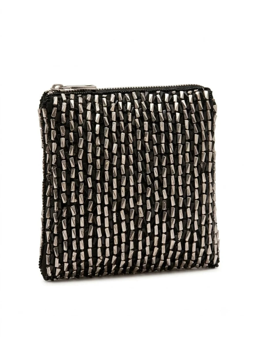 Anaya black envelope bag by THE TAN CLAN featuring a sleek, minimalist design with a fold-over flap and gold-tone clasp.