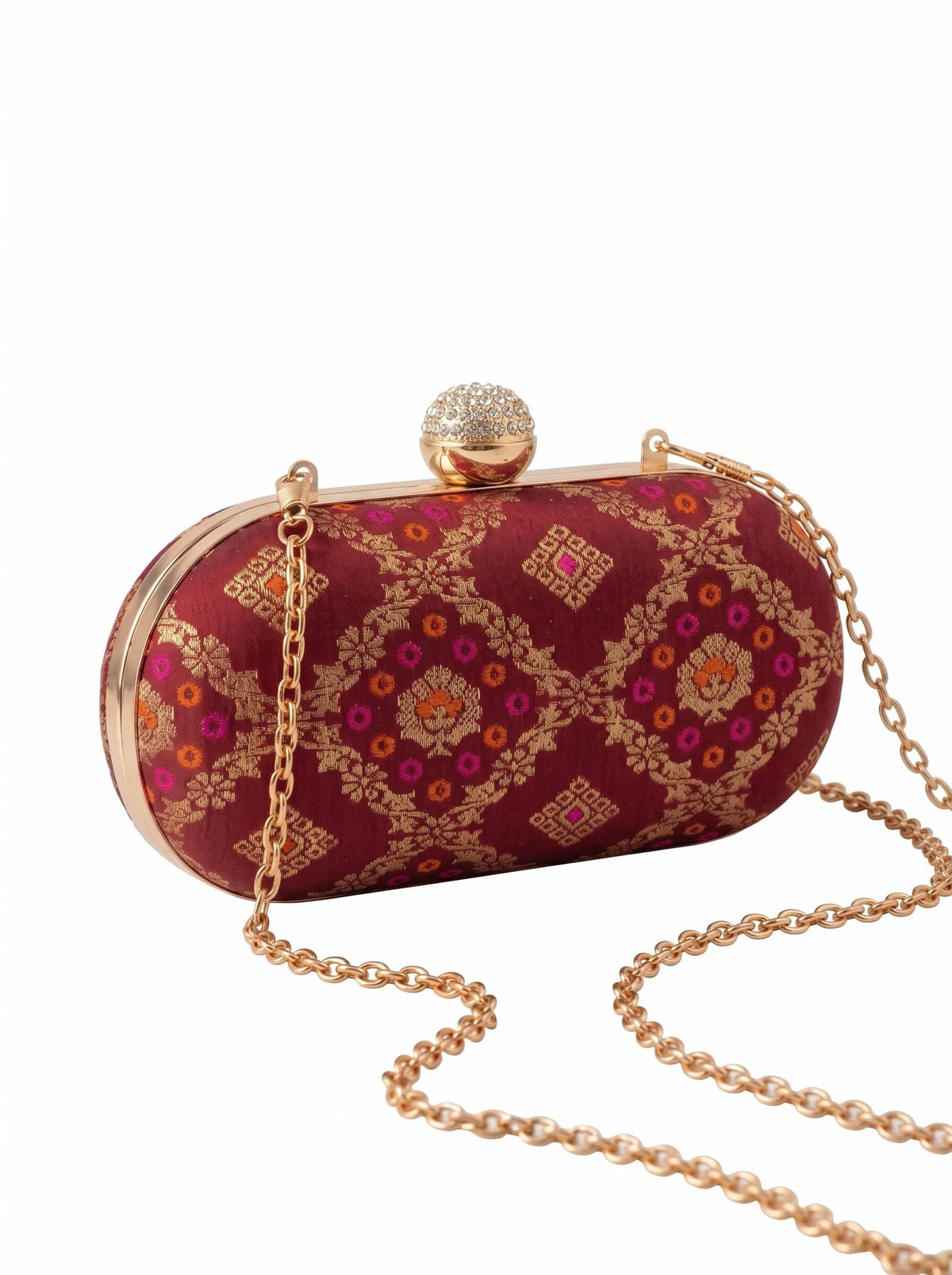 Red oval clutch bag from THE TAN CLAN with a sleek design and smooth leather finish.