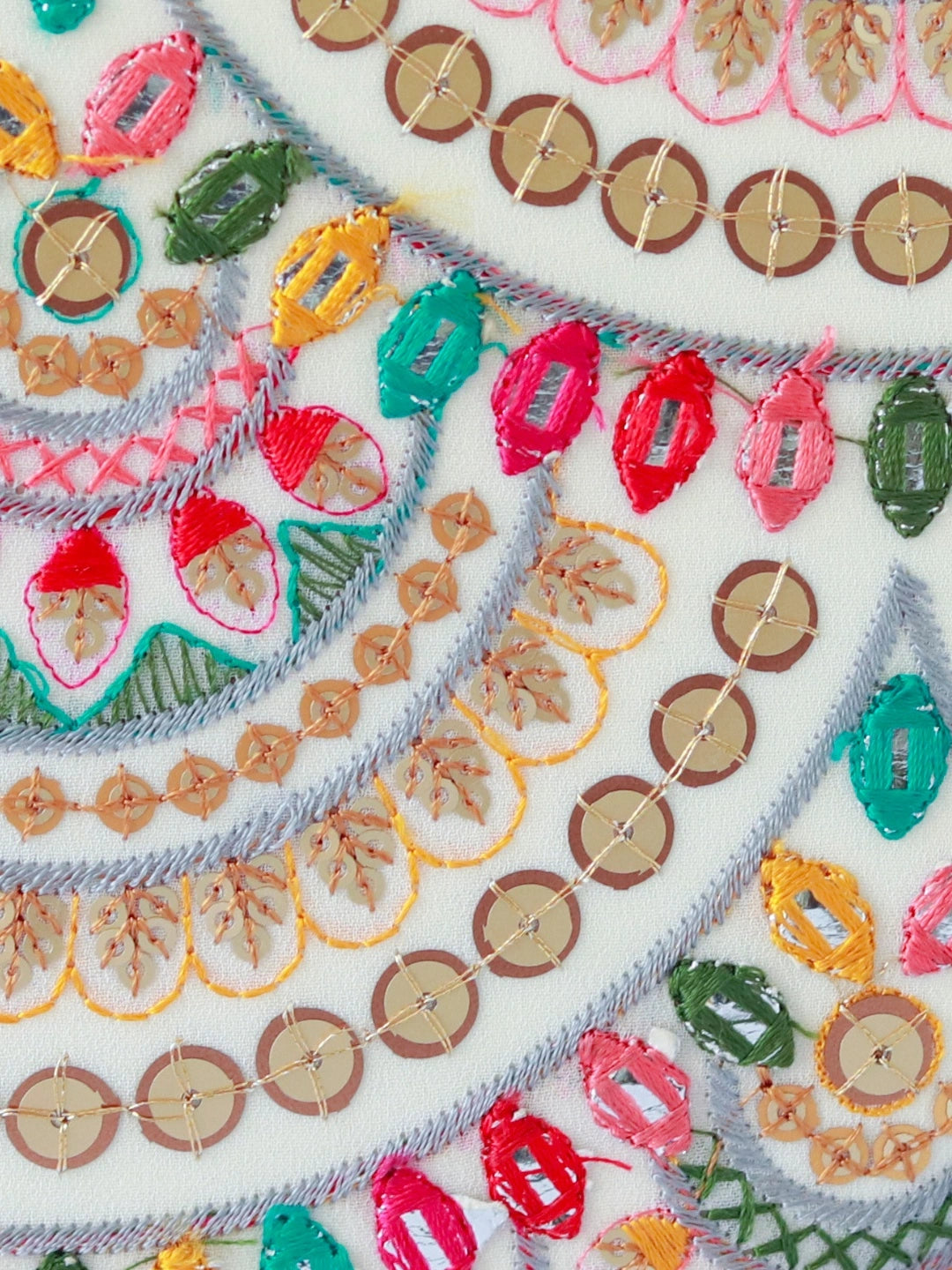 Multicolour embroidered clutch bag by The Tan Clan featuring intricate embroidery and a stylish design.