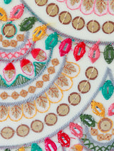 Multicolour embroidered clutch bag by The Tan Clan featuring intricate embroidery and a stylish design.