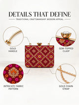 Red Mahi Casket Clutch bag by THE TAN CLAN with intricate design and gold accents, featuring a compact, stylish evening accessory.